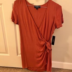 Lulu’s “Vashti Rusty Rose Wrap Dress” in color “Rusty Rose”. Never worn out
